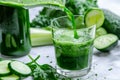 green detox smoothie with kale, spinach, and cucumber. Green vegetable juice on table. vegetables and glass of detox drink. fresh Royalty Free Stock Photo