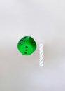 green dice flying next to white small ones.concept idea design on a white background Royalty Free Stock Photo