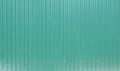 Green dirty steel sheet Zinc Fence texture background with shadow overlay