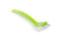 Green dish washing brush on white Royalty Free Stock Photo