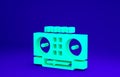 Green DJ remote for playing and mixing music icon isolated on blue background. DJ mixer complete with vinyl player and Royalty Free Stock Photo