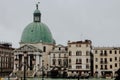 Green dome of San Simeone Piccolo church on a rainy day in Venice