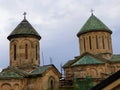 Green domes of the monastery of Gelati in Georgia after the rain.