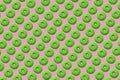 green donuts on light pink background small size
