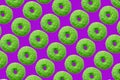green donuts on purple background big size