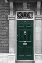 Green door of a home in London, England Royalty Free Stock Photo