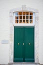 Green door in old stone house Royalty Free Stock Photo