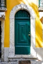 Green Door, Yellow House, Lisbon, Portugal Royalty Free Stock Photo