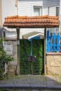 Green double metal gates with a roof Royalty Free Stock Photo