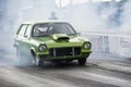 Green drag car smoke show Royalty Free Stock Photo