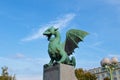 Green dragon standing on the bridge in old Ljubljana, Slovenia Royalty Free Stock Photo