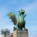 Green dragon standing on the bridge in old Ljubljana, Slovenia Royalty Free Stock Photo