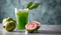 A green drink with a green leaf on top