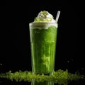 a green drink with whipped cream and a straw