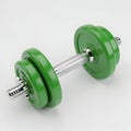 Green Dumbbell with Chrome Handle on White Background Royalty Free Stock Photo