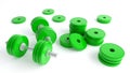 Green dumbbells on a white background close-up