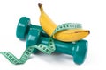 Green dumbell and banana Royalty Free Stock Photo