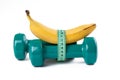 Green dumbell and banana