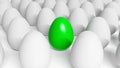 Green Easter egg among white eggs