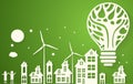 Green eco city with dry tree in light bulb eco concept Royalty Free Stock Photo