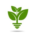 Green eco energy concept, plant growing inside light bulb. Royalty Free Stock Photo