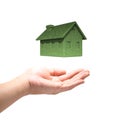 Green Eco house concept with hand Royalty Free Stock Photo