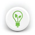 Green eco light bulb on badge Royalty Free Stock Photo