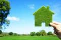Green ecological house in empty field Royalty Free Stock Photo