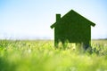 Green ecological house in empty field concept for construction and real estate Royalty Free Stock Photo