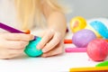 Green egg, colorful markers. heart pattern, on egg. Happy family is preparing for Easter and painting eggs Royalty Free Stock Photo