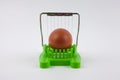 Green egg cutter with a boiled egg Royalty Free Stock Photo