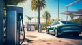 Green electric car connected to a charger in a clean, sunny lot with palm trees and modern architecture Royalty Free Stock Photo