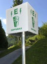 Green electric vehicle charging station sign