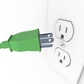 Green Electrical Plug into Wall Outlet