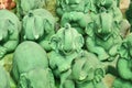 Green elephant sculptures