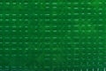 Green embossed surface background. closeup
