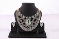 green emerald, diamonds necklace in gold is a unique and luxurious heritage, with matching earrings. Royalty Free Stock Photo