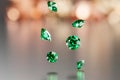 Green emerald gem crystal diamond group falling background soft focus with light bokeh 3d rendering Royalty Free Stock Photo