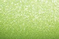 Green emerald glitter background.