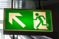 A green emergency exit sign close up Royalty Free Stock Photo