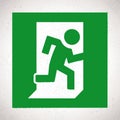 Green Emergency Exit Sign with running human figure