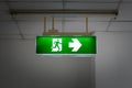 Green emergency exit sign Royalty Free Stock Photo