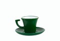 Green empty cup with saucer isolated Royalty Free Stock Photo