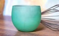 Green empty cup on wooden table Royalty Free Stock Photo