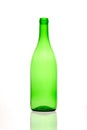 green and empty wine bottle with reflection on white background Royalty Free Stock Photo