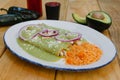 Green enchiladas mexican food with tomato sauce and cheese in mexico Royalty Free Stock Photo