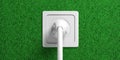 Electric power plug and socket isolated on green grass background. 3d illustration Royalty Free Stock Photo