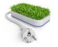 Green energy concept with plug and pot with grass. Royalty Free Stock Photo