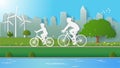 Green energy concepts, father and son are riding bicycle in city parks