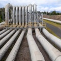 Green energy geothermal power station pipeline Royalty Free Stock Photo
